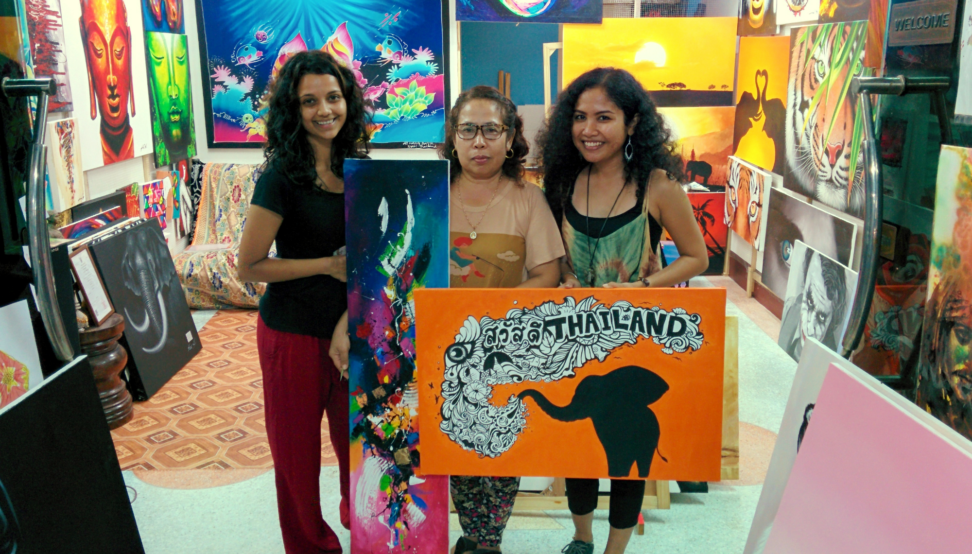 The wonderful artist Dao on the far right with her mum in the middle. The middle colourful piece is Kyles and the Thailand piece is mine :)